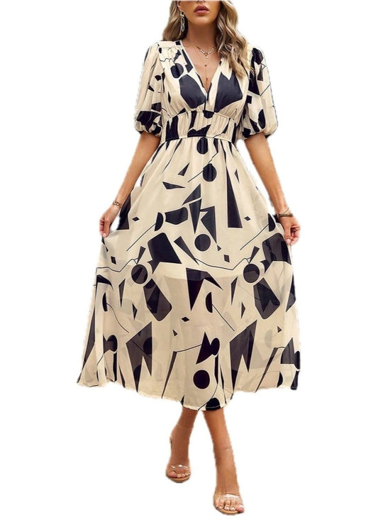 Puff Sleeve Dress. With a playful allover print and a flattering v-neckline, this midi length dress is perfect for any occasion. The added bonus of puff sleeves and lining will have you feeling comfortable and confident all day long. Get ready to turn heads and make a statement in this fashionable dress!